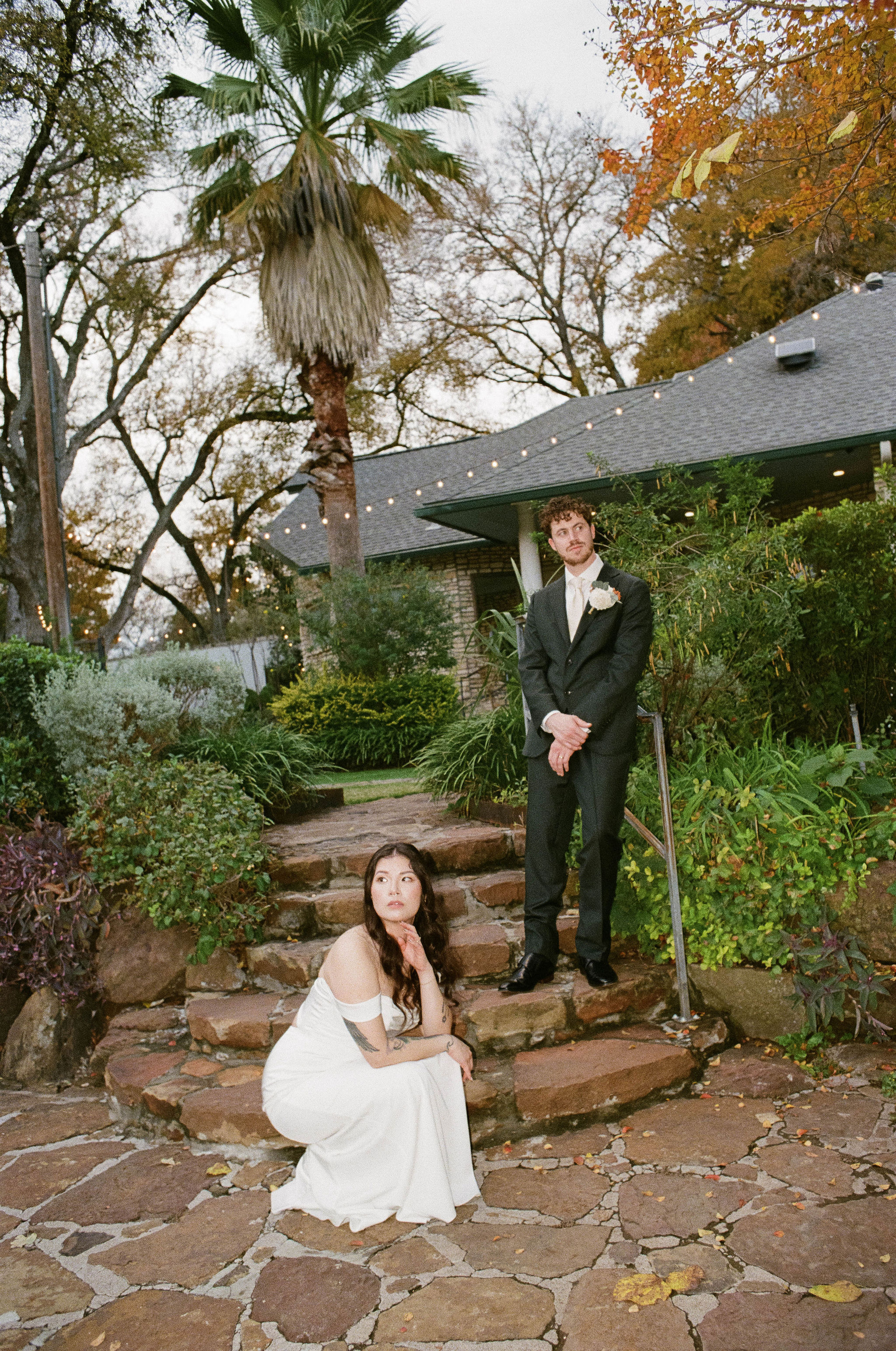 Bride and groom taking picture at Hummingbird House in Austin, Texas