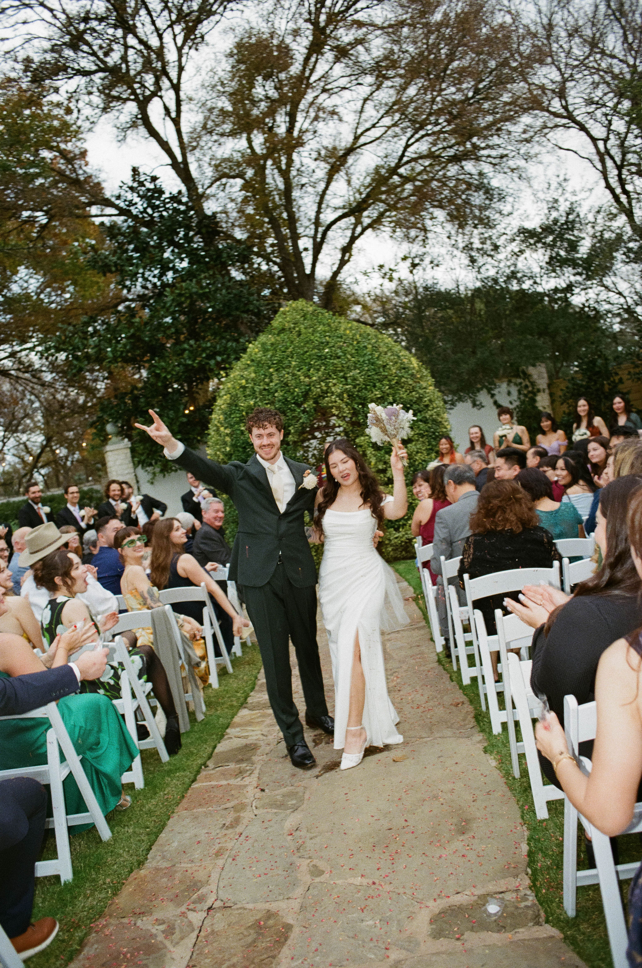 Bride & groom walking down the aisle at Hummingbird House in Austin, Texas