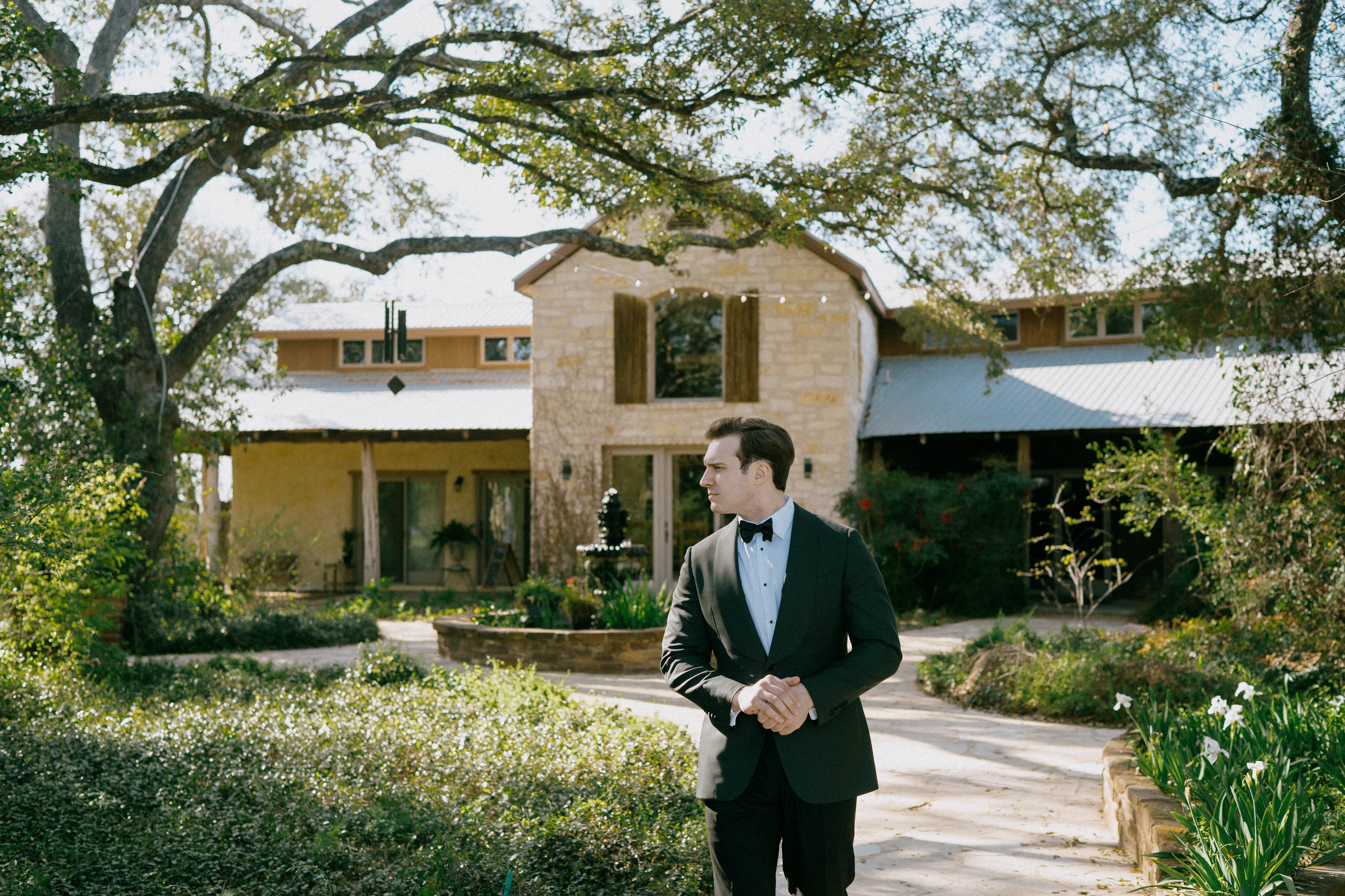 Groom outside of Hudson Bend Ranch in Austin, Texas