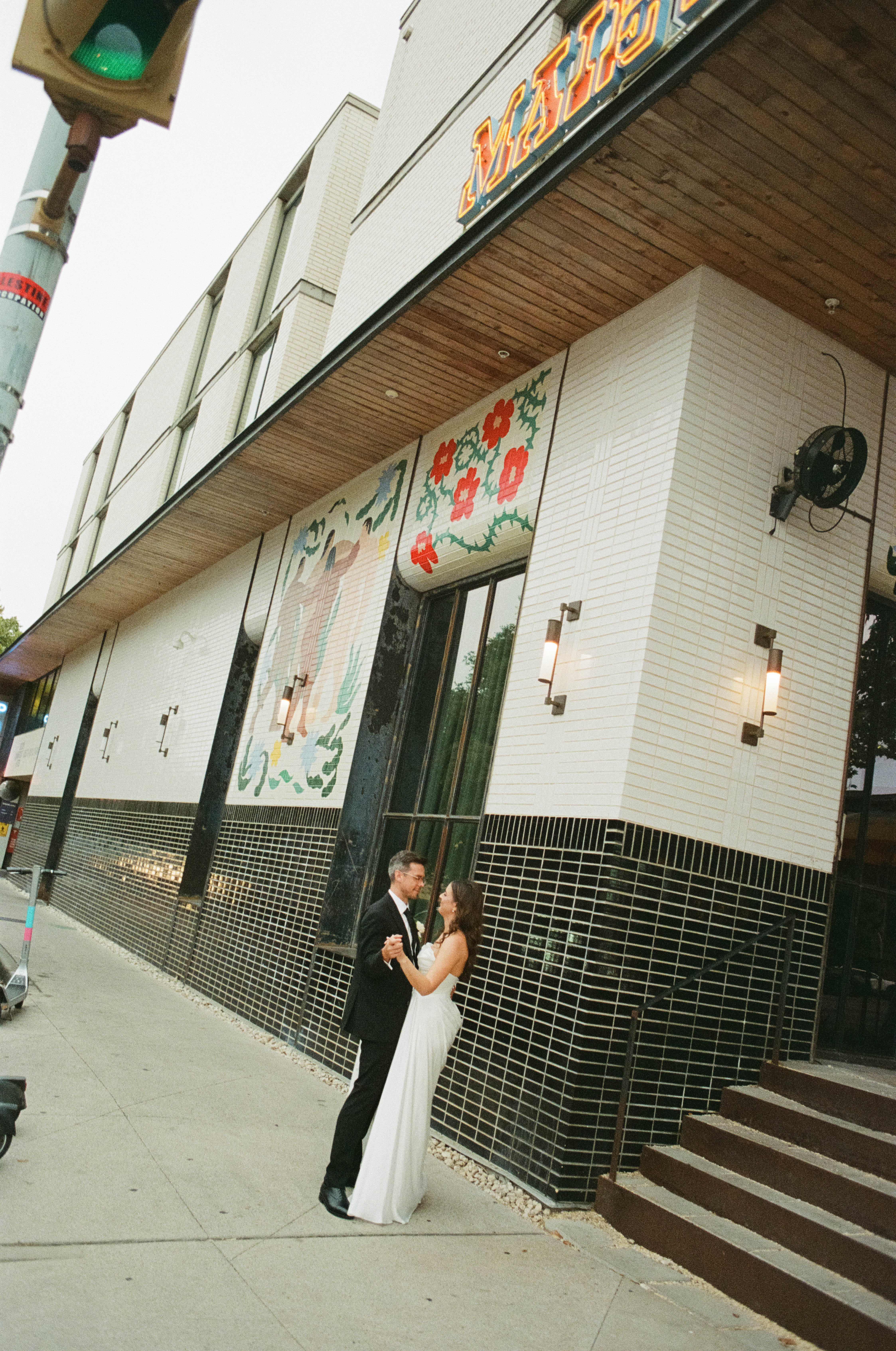 Bride and groom dancing on South Congress in Austin, Texas