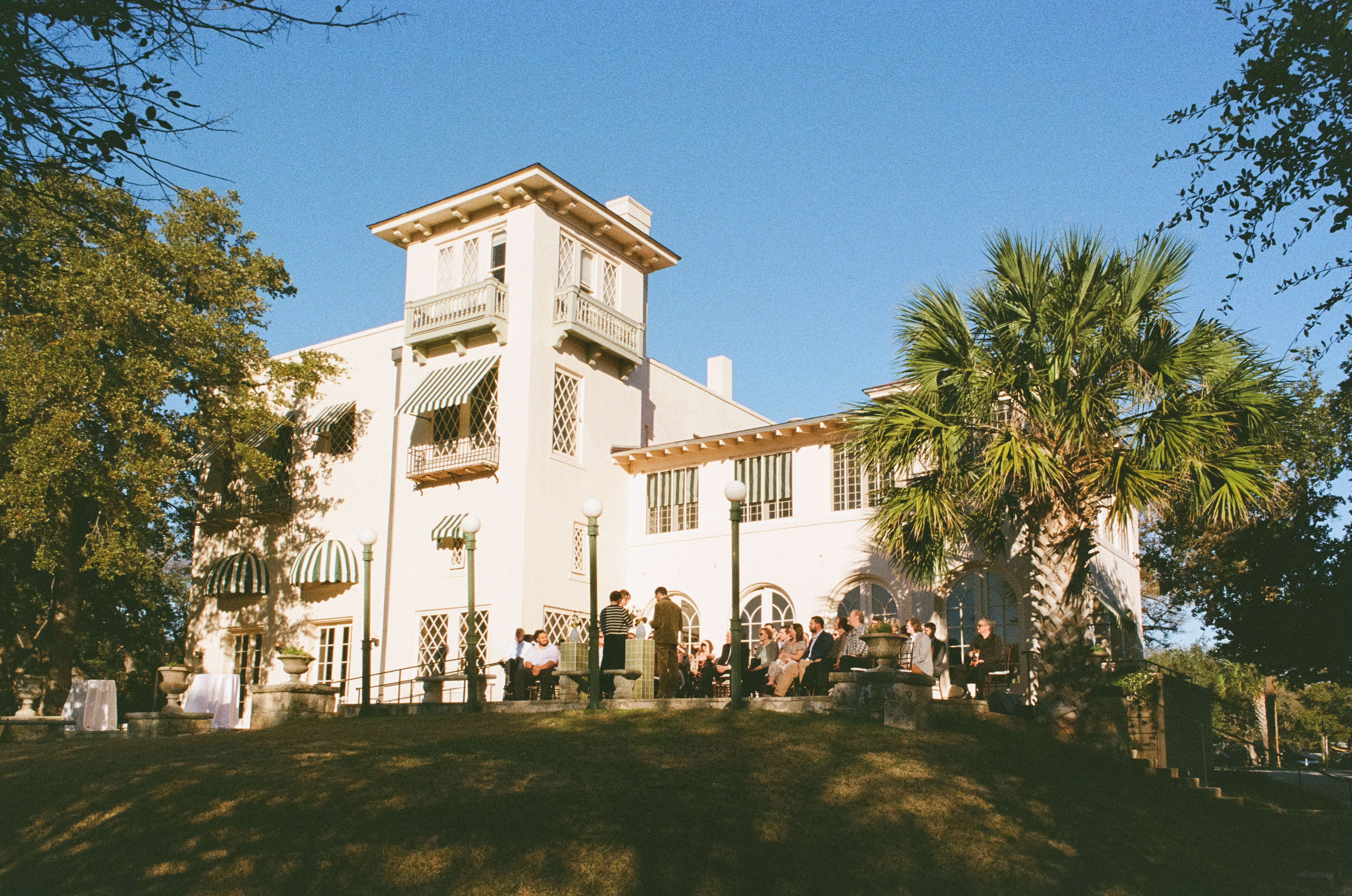 Wedding ceremony on porch of Laguna Gloria in Austin, Texas
