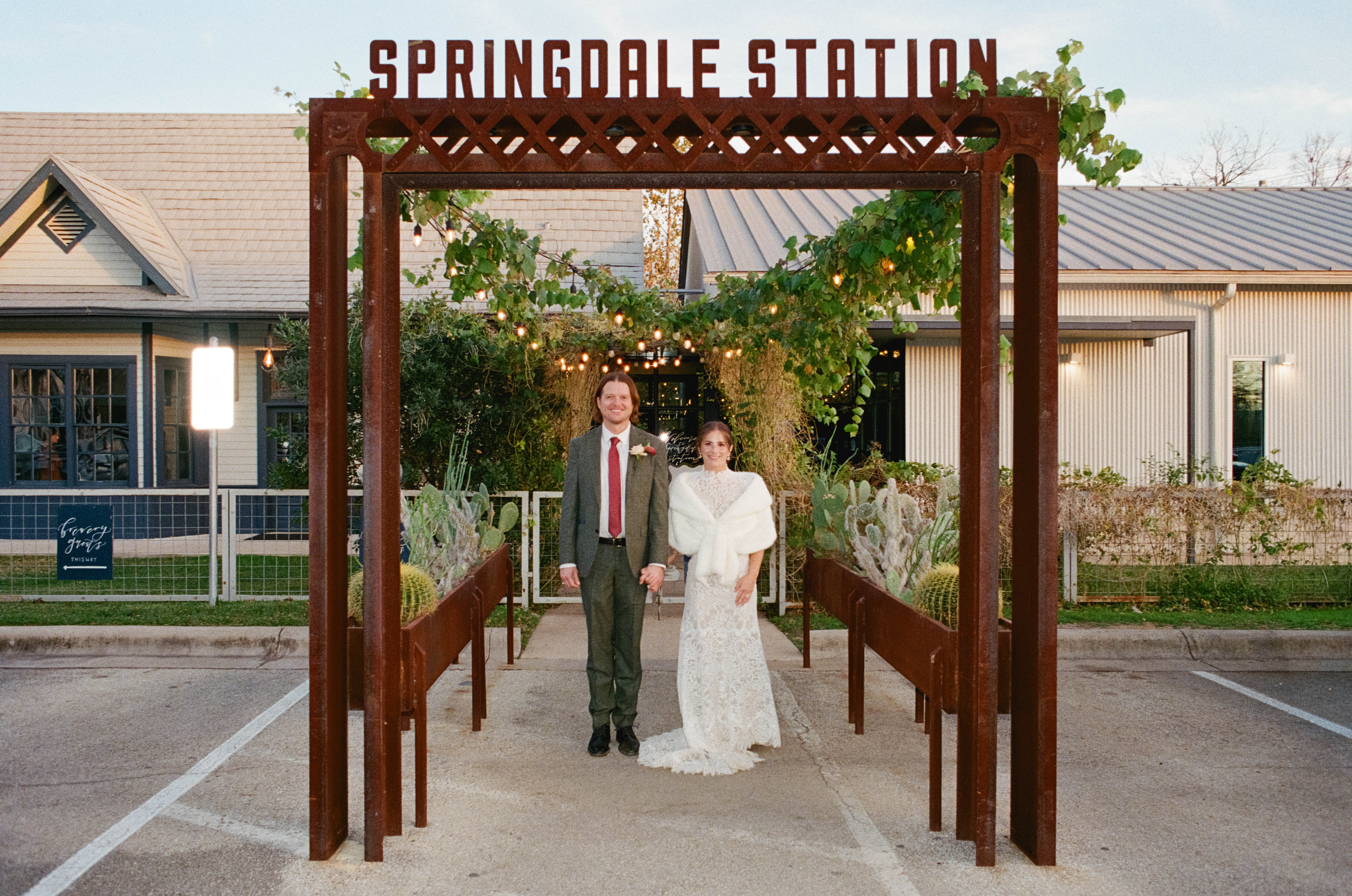 Bride and groom outside of Springdale Station in Austin, Texas